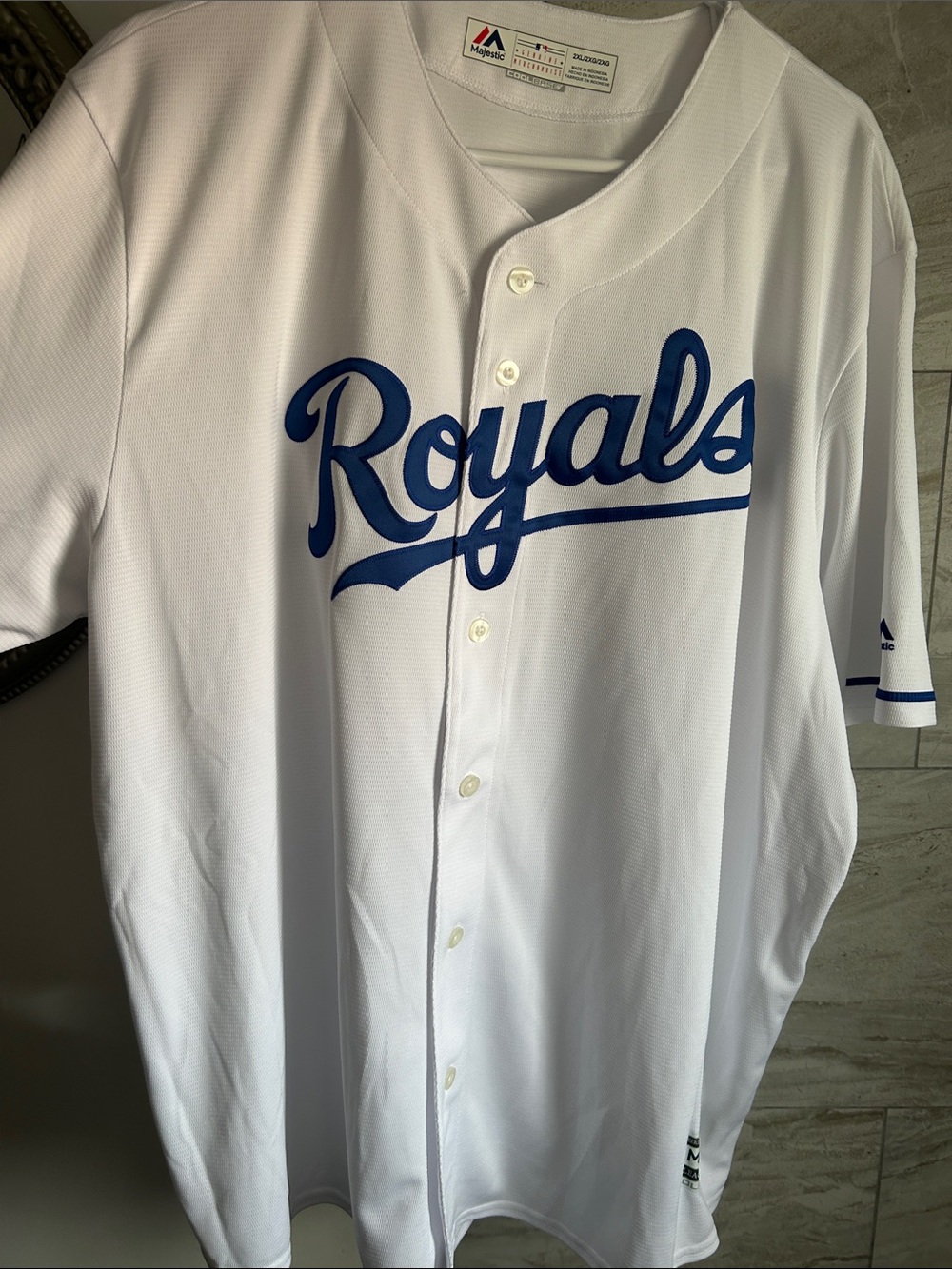 Majestic White Royals Button-Front Baseball Jersey with Blue Script